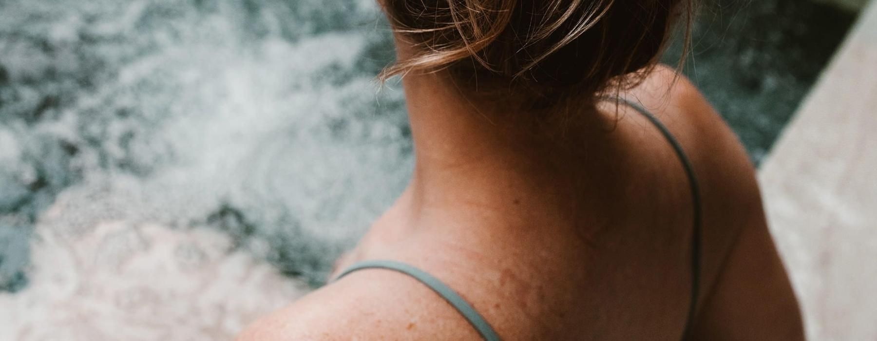 woman sitting in hot tub