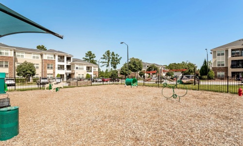 a playground with a fence