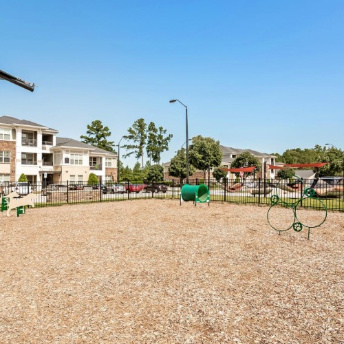 a playground with a fence
