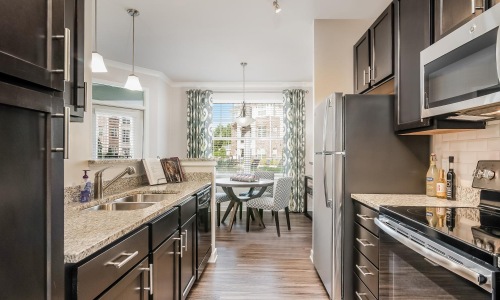 a kitchen with a large window