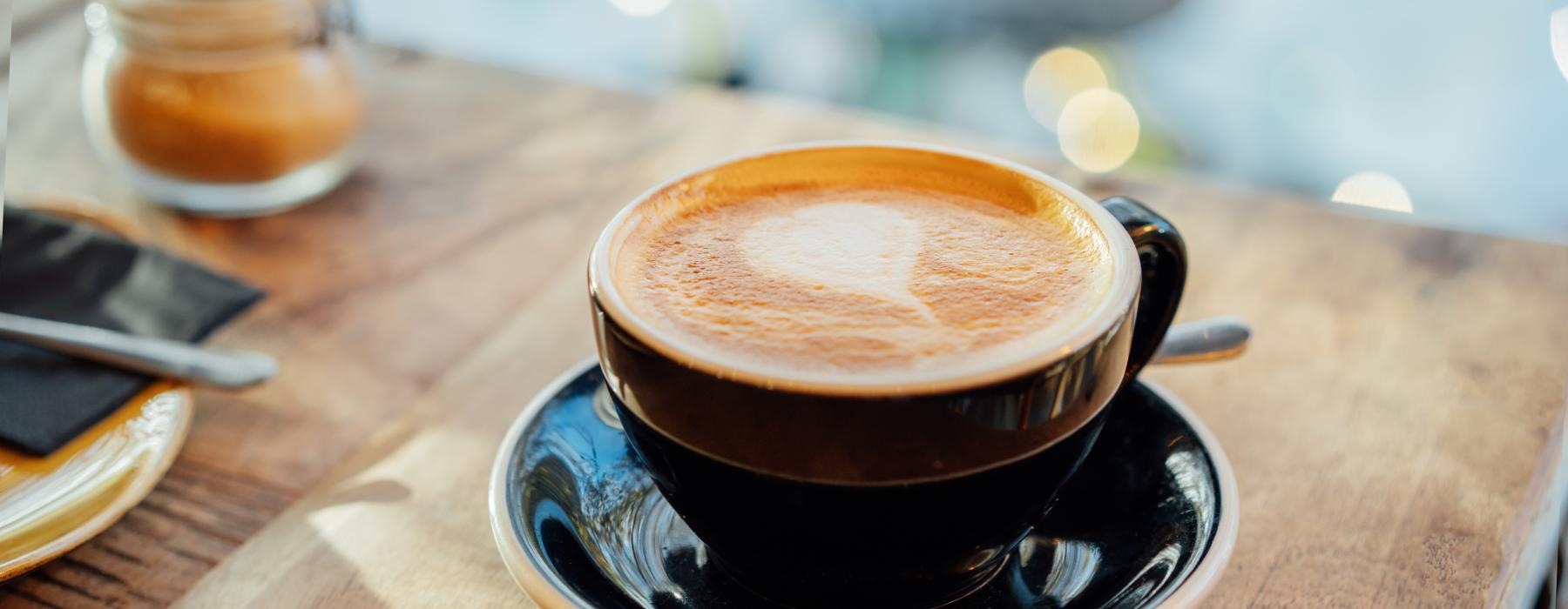 a cup of coffee on a saucer